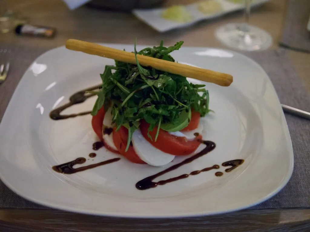 pair Caprese with rocket and a grissino at the Alasia